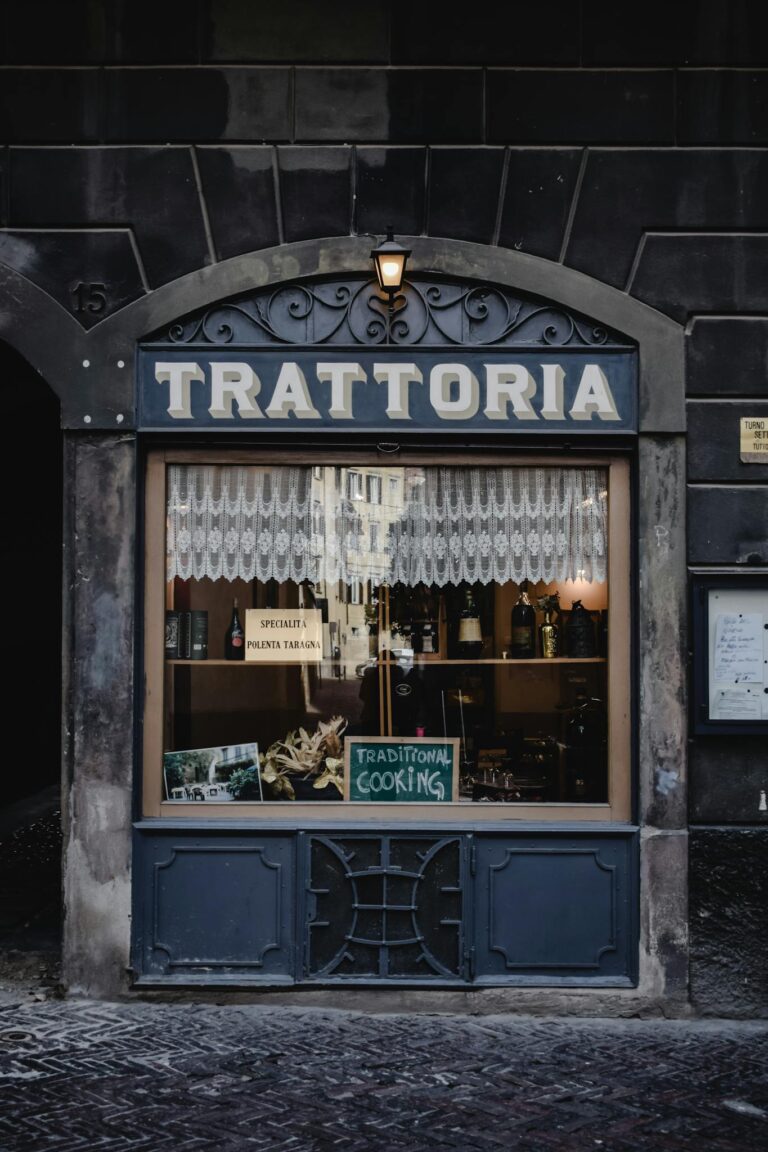 Historic trattoria facade in Bergamo, Italy, showcasing traditional Italian dining culture.